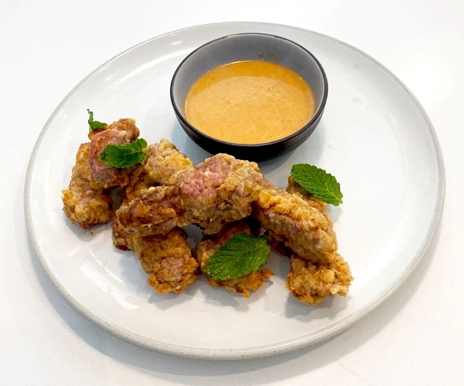 Country-Fried Strip Steak Bites with Hot Sauce White Gravy